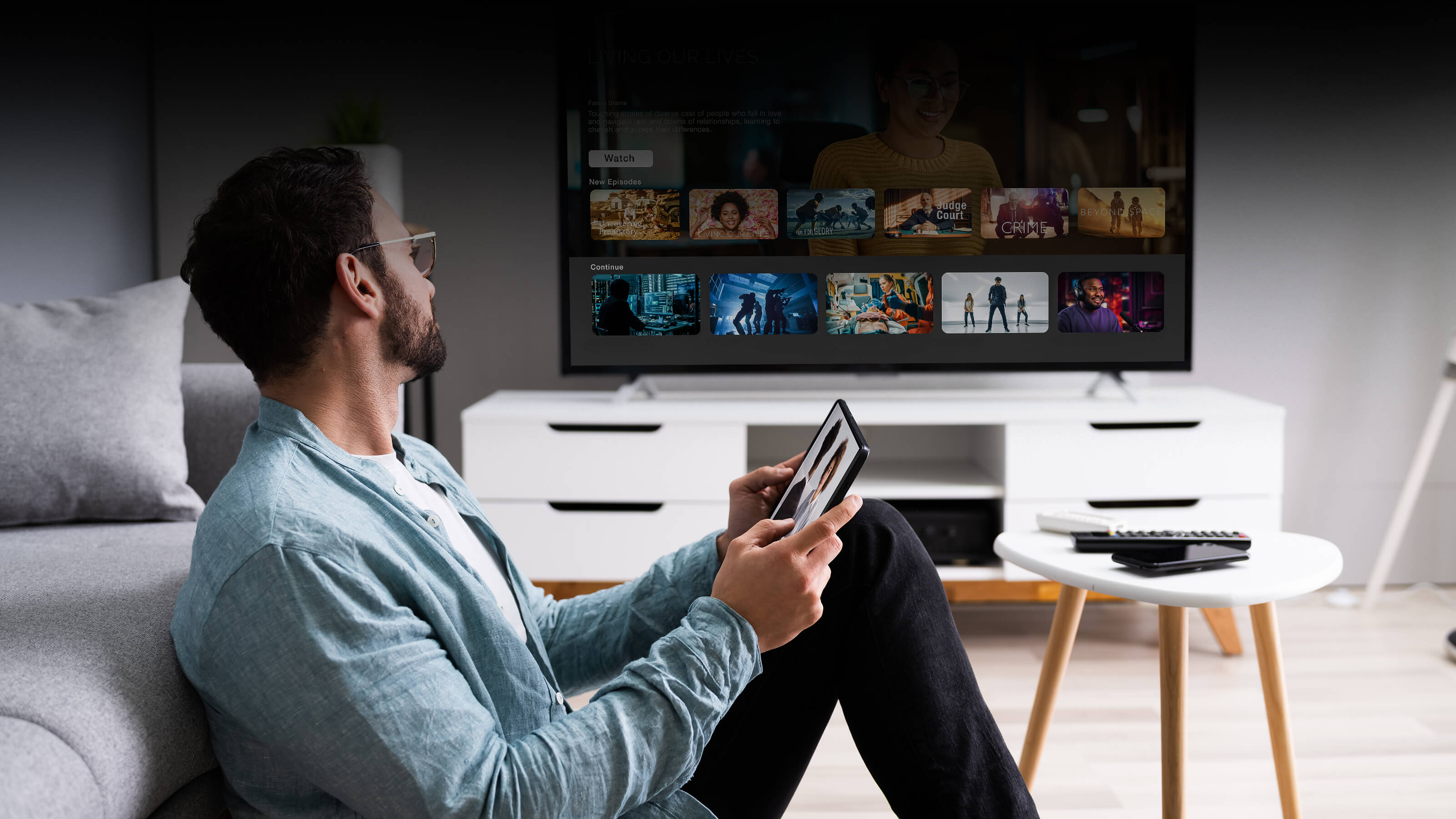 Person watching streaming tv Optimize Programmatic Monetization in Streaming TV