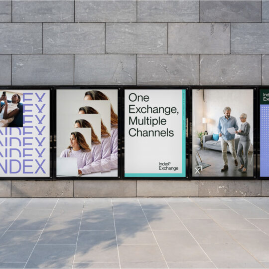 six posters showing index exchange's brand and the phrase the future of Omnichannel on a cement wall