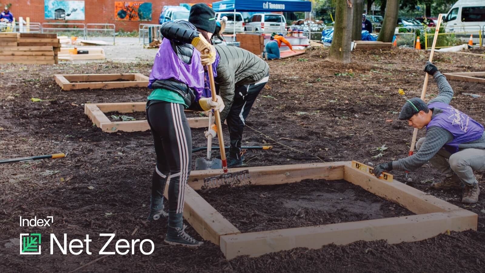 Index_net_zero_group_of_employees_volunteering_and_planting_things_careers