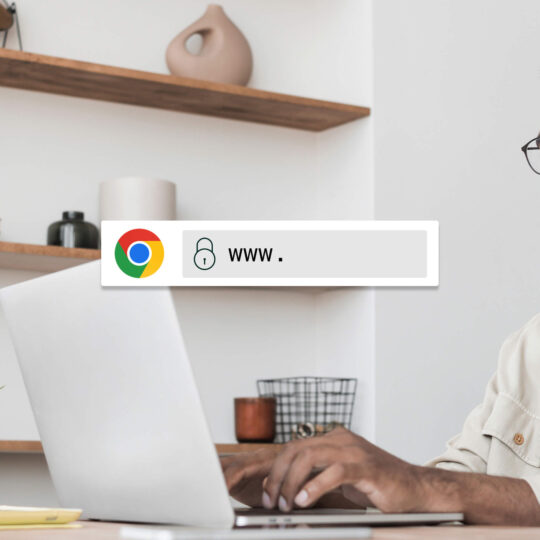 man using google chrome on laptop